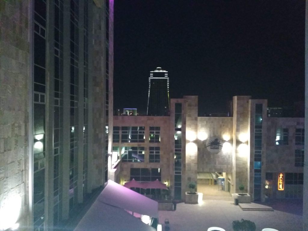 Traveyola iTowers at night in the background as seen from Masa Square at night in Gaborone, Botswana